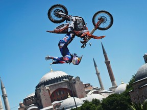 Mat Rebeaud of Switzerland performs a demo jump in front of the Hagia Sofia to announce the third stage of the Red Bull X-Fighters World Tour in Istanbul on June 13, 2012. AFP PHOTO/GLOBAL NEWSROOM/JOERG MITTER