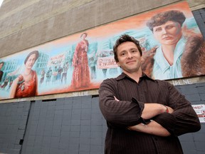 Artist Kris Friesen poses for a photo with the 44 foot by 10 foot mural he created which honours five Albertans who fought for women's rights in Canada, Tuesday July 3, 2012. The mural is located on the side of a parkade at 10027 - 102 Street, and features portraits of Emily Murphy, Irene Parlby, Louise McKinney, Henrietta Muir Edwards, and Nellie McClung. DAVID BLOOM EDMONTON SUN  QMI AGENCY