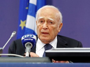 Greece’s President Karolos Papoulias addresses a news conference after a European Union leaders’ summit in Brussels on June 29. Eurozone leaders agreed to bend their aid rules to shore up banks and bring down the borrowing costs of stricken members. 
SEBASTIEN PIRLET/REUTERS