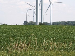 Turbines spin as part of the Enbridge Ontario Wind Power Project in Bruce Township, part of the Municipality of Kincardine, near the shores of Lake Huron. (TROY PATTERSON/KINCARDINE NEWS/QMI AGENCY)