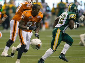 B.C. Lions slotback Geroy Simon loses his helmet after a pass intended for him was intercepted by the Edmonton Eskimos during the second half on Friday night in Vancouver.
Andy Clark/Reuters