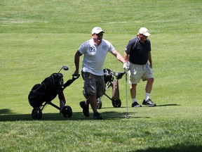 Friends hit the links at Northridge golf course. MICHAEL PEELING/QMI AGENCY