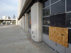 A boarded-up storefront on Fourth Street in San Bernardino, July 11, 2012.  REUTERS/Alex Gallardo