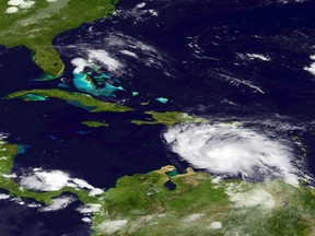 This National Oceanic and Atmospheric Administration (NOAA) image shows a GOES-East satellite photo of Tropical Storm Ernesto in the Atlantic on August 4, 2012. (AFP PHOTO/NOAA)