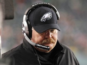 Philadelphia Eagles head coach Andy Reid walks the sideline after the Eagles loss to the Patriots in their NFL football game in Philadelphia Pennsylvania November 27, 2011. (REUTERS/Tim Shaffer)