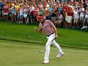 Keegan Bradley of the U.S. reacts after making a par putt on the 18th hole during the final round of the WGC-Bridgestone Invitational golf tournament in Akron, Ohio, August 5, 2012.  REUTERS/Matt Sullivan