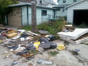 Stacy Ebear said this mess was left behind her Weston-area home after city workers came to pick up the nearby autobin. (Photo courtesy of Stacy Ebear)