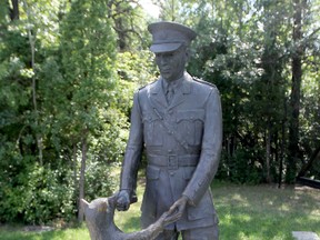 The well-known statue of Winnie the Bear and Lt. Harry Colebourn is now on display inside the Nature Playground at Assiniboine Park. (CHRIS PROCAYLO/Winnipeg Sun)