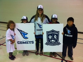 Michaela Briscoe (centre), who won a naming contest, poses with kids from the community at Crescentwood Wednesday. Under a recent amalgamation, the Crescentwood Grizzlies, River Heights Cardinals and Sir John Franklin Explorers will all become Corydon Comets. (WINNIPEG SUN)