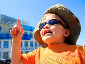 Wearing sunscreen and protective clothing are key to avoiding sun- and heat-related illness, experts say. (Postmedia Network)