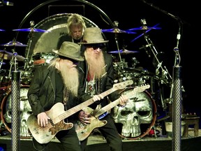 ZZ Top's Dusty Hill and Billy Gibbons perform in Moscow, July 16, 2012. (WENN.COM)