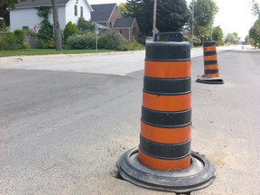 The intersection of Graham Rd. and Elm St. in West Lorne shows uneven pavement after water line replacement work was done between May and July. The West Lorne roads that were affected by the water line replacement will be leveled out by the end of next week, according to West Elgin's Roads Superintendent.