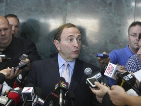 NHL Commissioner Gary Bettman speaks at a press conference in Toronto on Thursday, August 23, 2012. The labour talks with the players association will continue in New York on Tuesday. (Veronica Henri/QMI Agency)