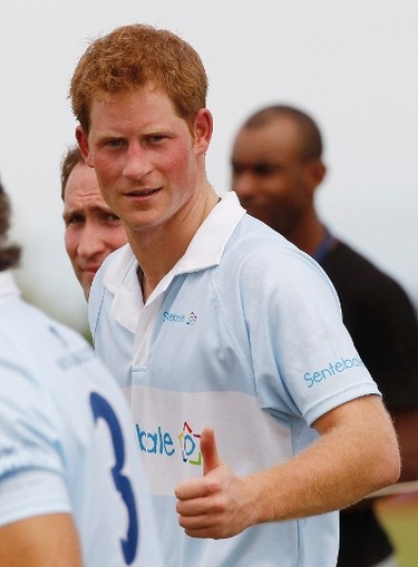Britain's Prince Harry gestures after participating at the Sentebale Polo Cup in Campinas, Brazil March 11, 2012. (REUTERS/Suzanne Plunkett)
