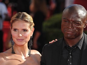 Heidi Klum and Seal in Los Angeles on April 6, 2012.      AFP PHOTO / Files / ROBYN BECK