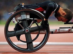 Canada's Brent Lakatos prepares for the start of the men's 400m T53 classification during the London 2012 Paralympic Games, Sept. 2, 2012. (EDDIE KEOGH/Reuters)