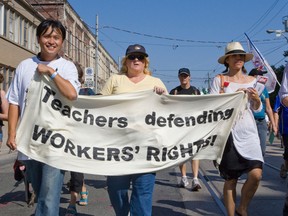 The ongoing battle between Ontario's teachers and the provincial government was front and centre at this year' s Labour Day parade.
(DAVE THOMAS, Toronto Sun)