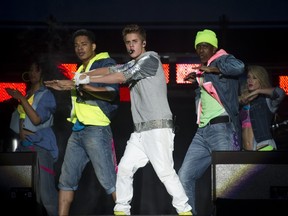 Canadian singer Justin Bieber performs during a concert at the Zocalo square, in Mexico City, on June 11, 2012. (RONALDO SCHEMIDT/AFP)