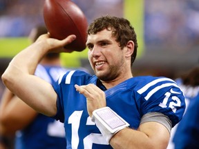 Colts rookie QB Andrew Luck has a big fan in Randall the Handle. (Getty Images)