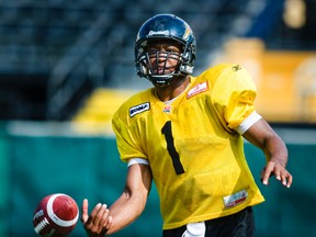 Tiger-Cats quarterback Henry Burris stays loose during practice at Ivor Wynne Stadium in Hamilton yesterday as the Ticats prepare for their Saturday rematch with the rival Argonauts. (Ernest Doroszuk/Toronto Sun)