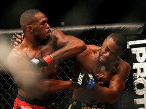 Jon Jones (L) will fight Vitor Belfor at UFC 152. Jones is pictured elbowing Rashad Evans during their light heavyweight title bout at UFC 145 on April 21, 2012 in Atlanta, Ga. (GETTY IMAGES/AFP)