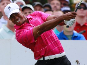 Tiger Woods, who tied for fourth at the BMW Championship, moved up to second in the world rankings. (Brent Smith/Reuters)