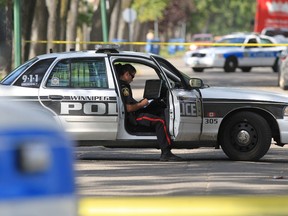 Winnipeg police investigate the murder of Paris Bruce, 16, in the 300-block of Aberdeen Avenue, on Sept. 4, 2012. (Chris Procaylo/Winnipeg Sun)