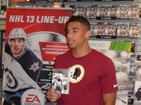 Unsigned Winnipeg Jets winger Evander Kane was at an EB Games in Winnipeg on Monday for the launch of EA Sports NHL 13 but didn't shed any light on his contract negotiations. (Ken Wiebe/Winnipeg Sun)