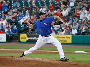 Roger Clemens delivers a pitch in the first inning for the Sugar Land Skeeters against the Long Island Ducks in Sugar Land, Texas, on Sept. 7, 2012. The game was the second outing with the Skeeters for Clemens. (Donna Carson/Reuters)