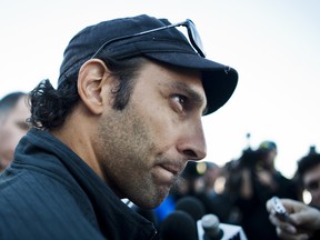 Canucks goaltender Roberto Luongo speaks to the media during the Jake Milford Canucks Charity Invitational golf tournament at Northview Golf & Country Club in Surrey, B.C., Sept. 12, 2012, (CARMINE MARINELLI/QMI Agency)