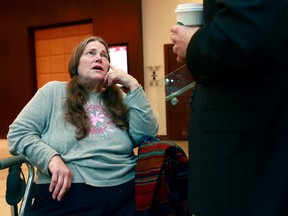 Jessica Johnson talks to her lawyer at an Ottawa hotel on Wednesday Sept. 12, 2012.   Tony Caldwell/Ottawa Sun/QMI Agency