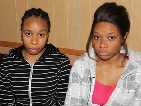 Ihuoma Amadi, 21, left, and Victoria Ordu, 20, international University of Regina students from Nigeria, are pictured at an undisclosed church on Thurs., Sept. 13, 2012. (QMI Agency/LISA MRAZEK)