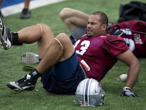Brody McKnight, shown warming up prior to practice with the Montreal Alouettes, was traded to the Eskimos last week. His debut Saturday in Hamilton ended up as a blocked field that was returned for a touchdown in the Eskimos 512-8 loss to the Ticats.
Martin Chevalier, QMI Agency