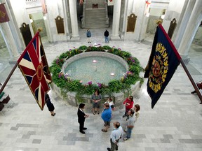 A tour group is lead through the rotunda at the Alberta Legislature, Saturday September 15, 2012. Former Alberta Premier Peter Lougheed will be lying-in-state in the rotunda September 17 and 18. (DAVID BLOOM/QMI AGENCY)