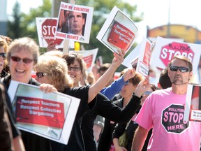 Teachers protest outside Sault Ste. Marie MPP David Orazietti's office on Saturday, Sept. 15, 2012.