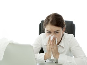 A new study has found that those with allergies may suffer more from their symptoms at the office. (Fotolia)