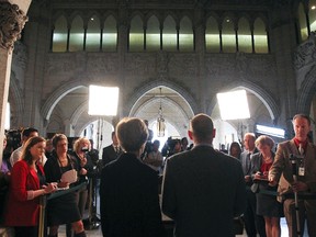 Official Opposition House Leader Nathan Cullen and Chief Opposition Whip Nycole Turmel speak to the media at Parliament Hill in Ottawa, Sept. 17, 2012. (Andre Forget/QMI Agency)