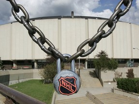 photo illustration for the NHL lockout with Rexall Place in the background.
PHOTO ILLUSTRATION