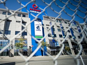 Rogers Arena seen through a chain link fence in Vancouver. (QMI AGENCY)