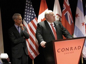 Toronto Mayor Rob Ford and Chicago Mayor Rahm Emanuel at a press conference in Chicago signing the joint sister cities declaration in this file photo from Sept. 19, 2012. (DON PEAT/Toronto Sun files)