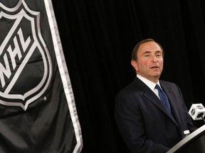 NHL commissioner Gary Bettman speaks to the media in New York September 13, 2012. The league and the players collective bargaining agreement ends at midnight on Saturday.  REUTERS/Carlo Allegri