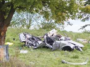 Scene of a single vehicle crash that killed two people on McCormick Road, in North Glengarry Township near Alexandria, on Sunday. The driver, himself hospitalized with serious injuries, has since been charged by police.
(Errol McGihon/QMI Agency)