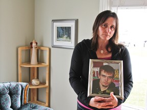 Moonbeam resident Mona Meilleur cradles a photo of her deceased son Maxim in her arms. Maxim’s brain was one of 4,000 organs retained by the Ontario Coroner’s Office post-autopsy.