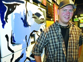 Ryan Mahy, Artfusion’s founder and art director, in the local gallery September 21, 2012.