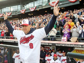 Winnipeg Goldeyes pitcher Brian Beuning celebrated their championship win with fans at Shaw Park on Sunday, September 16. (BRIAN DONOGH/Winnipeg Sun files)