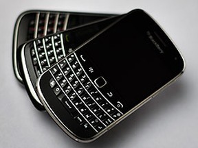 The Research in Motion (RIM) BlackBerry 9900 smartphone handset is stacked on top of other Blackberry smartphones in this illustration picture taken in Lavigny on July 21, 2012. (REUTERS/Valentin Flauraud)