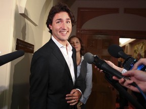 Liberal MP Justin Trudeau walks past the media before the Liberal Caucus at Parliament Hill September 26, 2012, in Ottawa, Ontario. (QMI Agency/ANDRE FORGET)