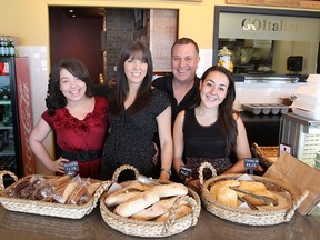 Heather and Joel Branstein, middle, with daughters Alex, left, and Erica, brought Italian food to ‘takeout Mecca’ on Princess Street with the opening of their eat-in and take out restaurant, Go Italian. (MICHAEL LEA/The Whig-Standard)