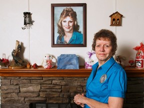 Paula Wheeler stands in front of a memorial for her daughter Chevelle, in her home in Crossville, Tennessee on September 27, 2012. (REUTERS/Harrison McClary)