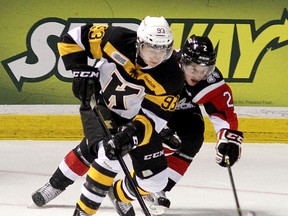 Kingston Frontenacs Sam Bennett, seen here driving the net past Niagara Ice Dogs Jesse Graham during Ontario Hockey League action at the Rogers K-Rock Centre last season, will be looked upon to give the team some much-needed offensive output. IAN MACALPINE/KINGSTON WHIG-STANDARD/QMI AGENCY